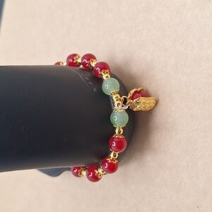 Elegant Red Beaded Bracelet with Gold Peanut